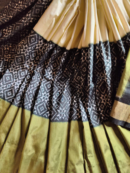 CREAM BLACK AND MEHENDI GREEN  SILK PURE HANDLOOM IKKAT SAREE