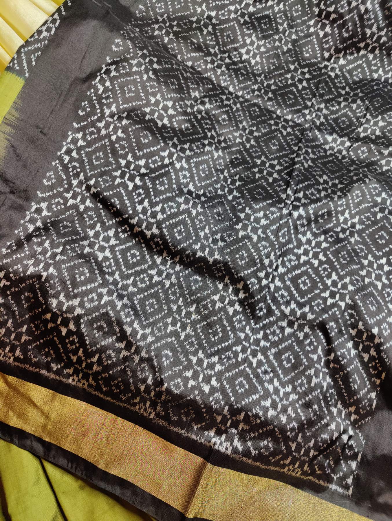CREAM BLACK AND MEHENDI GREEN  SILK PURE HANDLOOM IKKAT SAREE